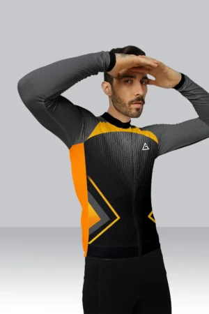 Cyclist wearing Premium Custom Cycling Jersey with black and yellow race-fit design, YKK zipper, and rear reflector pockets.